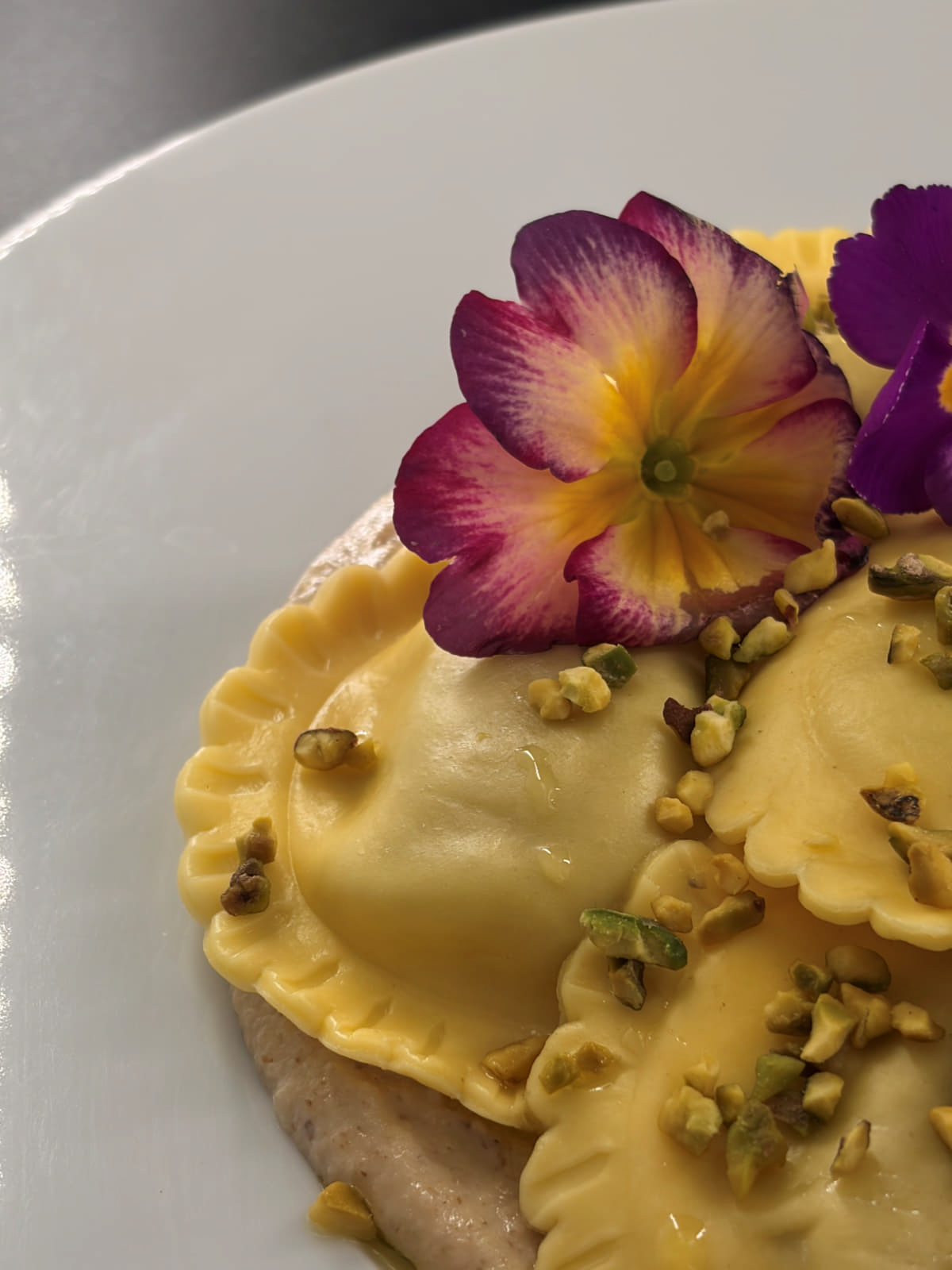 Mezzelune di ricotta e rucola al burro alle erbe